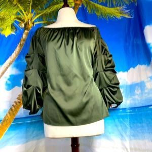 Dark green silky like long sleeve blouse.